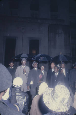 Fred Shuttlesworth speaking to demonstrators outside the Jefferson County courthouse in Birmingham, Alabama, during the incarceration of Martin Luther King, Jr., and several other civil rights leaders.
