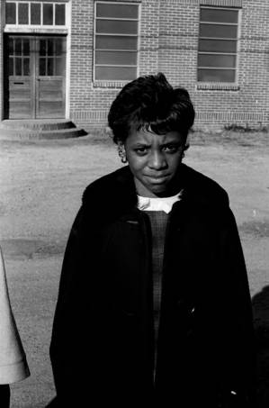 Latricia Hadnott standing in front of the First Missionary Baptist Church in Prattville, Alabama.