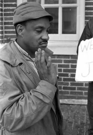 Scott B. Smith of SNCC standing in front of the Barbour County courthouse in Eufaula, Alabama.