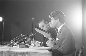 Senators Joseph Clark and Robert F. Kennedy of the Senate Subcommittee on Employment, Manpower, and Poverty, listening to testimony during a hearing at the Heidelberg Hotel in Jackson, Mississippi.