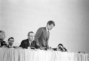 Senators Jacob Javits, Joseph Clark, and Robert F. Kennedy of the Senate Subcommittee on Employment, Manpower, and Poverty, listening to testimony during a hearing at the Heidelberg Hotel in Jackson, Mississippi.