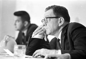 Man seated at a table, listening to testimony before the Senate Subcommittee on Employment, Manpower, and Poverty, during a hearing at the Heidelberg Hotel in Jackson, Mississippi.