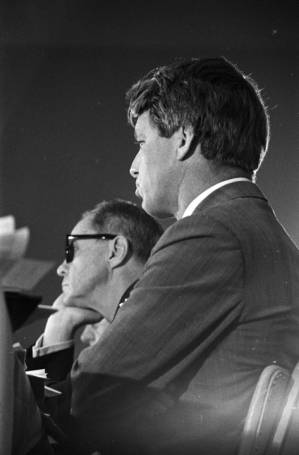 Senators Joseph Clark and Robert F. Kennedy of the Senate Subcommittee on Employment, Manpower, and Poverty, listening to testimony during a hearing at the Heidelberg Hotel in Jackson, Mississippi.