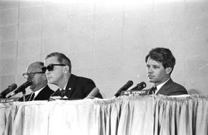 Senators Jacob Javits, Joseph Clark, and Robert F. Kennedy of the Senate Subcommittee on Employment, Manpower, and Poverty, listening to testimony during a hearing at the Heidelberg Hotel in Jackson, Mississippi.