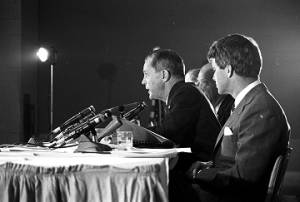 Senators Jacob Javits, Joseph Clark, and Robert F. Kennedy of the Senate Subcommittee on Employment, Manpower, and Poverty, listening to testimony during a hearing at the Heidelberg Hotel in Jackson, Mississippi.