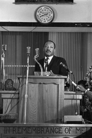 Martin Luther King, Jr., speaking to an audience at Maggie Street Baptist Church in Montgomery, Alabama.