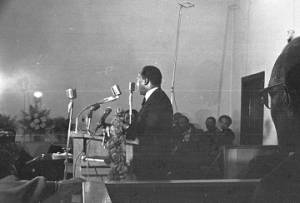 Martin Luther King, Jr., speaking to an audience at Maggie Street Baptist Church in Montgomery, Alabama.