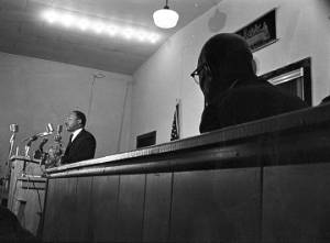 Martin Luther King, Jr., speaking to an audience at Maggie Street Baptist Church in Montgomery, Alabama.