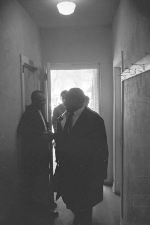 Martin Luther King, Jr., and others entering Maggie Street Baptist Church in Montgomery, Alabama, before a meeting.