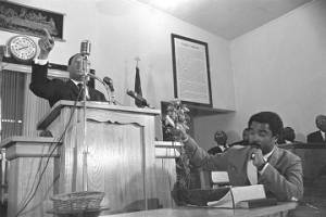 Martin Luther King, Jr., speaking to an audience at Maggie Street Baptist Church in Montgomery, Alabama.