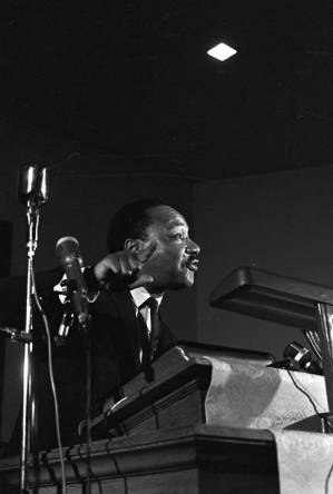 Martin Luther King, Jr., speaking to an audience at St. Paul AME Church in Birmingham, Alabama.