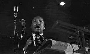 Martin Luther King, Jr., speaking to an audience at St. Paul AME Church in Birmingham, Alabama.