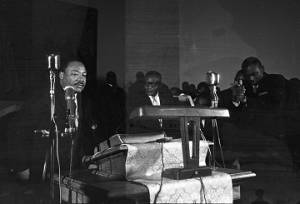Martin Luther King, Jr., speaking to an audience at St. Paul AME Church in Birmingham, Alabama.