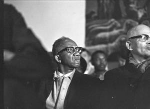 Man sitting in an audience at St. Paul AME Church in Birmingham, Alabama, probably listening to Martin Luther King, Jr., speak.