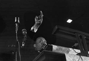 Martin Luther King, Jr., speaking to an audience at St. Paul AME Church in Birmingham, Alabama.