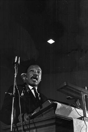 Martin Luther King, Jr., speaking to an audience at St. Paul AME Church in Birmingham, Alabama.