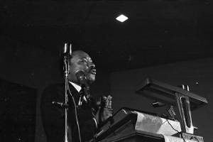 Martin Luther King, Jr., speaking to an audience at St. Paul AME Church in Birmingham, Alabama.