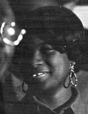 Barbara Howard Flowers sitting in an audience at St. Paul AME Church in Birmingham, Alabama, probably listening to Martin Luther King, Jr., speak.