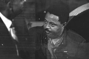 Hosea Williams seated during a meeting at St. Paul AME Church in Birmingham, Alabama.