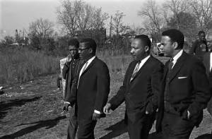 Martin Luther King, Jr., and others arriving for a meeting at Harrison Street Baptist Church in Greenville, Alabama.