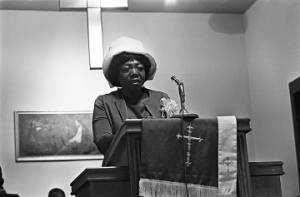 Idessa Williams speaking to an audience at Hall Street Baptist Church in Montgomery, Alabama.