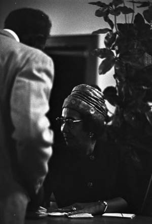 Woman seated at a table during a program at Hall Street Baptist Church in Montgomery, Alabama.