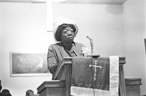Idessa Williams speaking to an audience at Hall Street Baptist Church in Montgomery, Alabama.