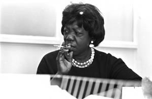 Idessa Williams of the Montgomery Improvement Association, seated at a table during an interview.