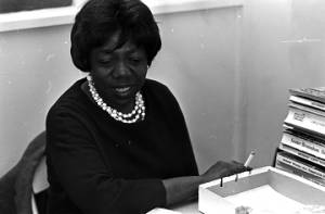 Idessa Williams of the Montgomery Improvement Association, seated at a table during an interview.