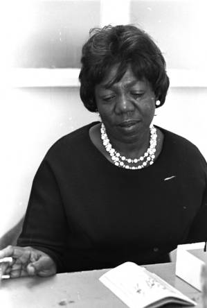 Idessa Williams of the Montgomery Improvement Association, seated at a table during an interview.
