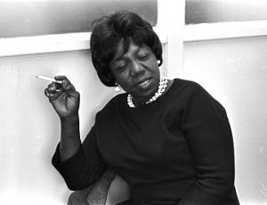 Idessa Williams of the Montgomery Improvement Association, seated at a table during an interview.