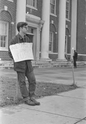 Mike Bibler of SCLC standing in front of the Barbour County courthouse in Eufaula, Alabama.