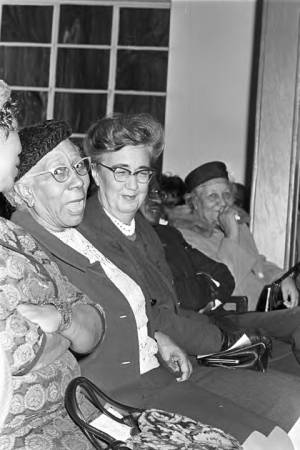 Irene West, Virginia Durr, and Carrie D. Hubbard seated in the audience at Holt Street Baptist Church.