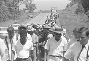 Martin Luther King, Jr., and others, participating in the "March Against Fear" through Mississippi, begun by James Meredith.