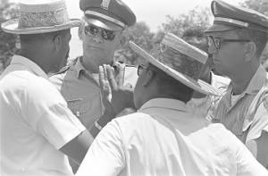 Robert L. Green and Martin Luther King, Jr., speaking to Mississippi Highway Patrol officers during the "March Against Fear" through Mississippi, begun by James Meredith.