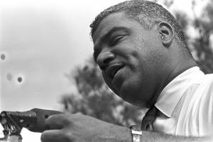 Whitney M. Young, Jr., addressing a crowd in front of the state capitol in Jackson, Mississippi, at the end of the "March Against Fear" begun by James Meredith.