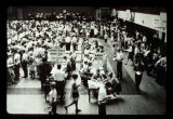 People gathering in a gymnasium