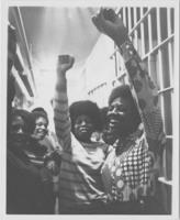 Three Unidentified Women Raise Their Fists, circa 1972