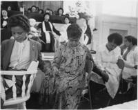 A Group of Women Holding Hands and Praying at the National Women's Candlelight Prayer Service, April 5, 1981