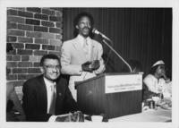 E. Randel T Osburn Speaking at an Event, circa 1985