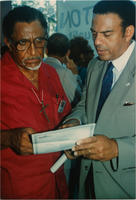 Joseph E. Lowery and Andrew Young Reviewing a Document, August 1983
