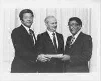 Joseph E. Lowery Being Presented a Check, circa 1979