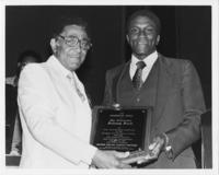 Joseph E. Lowery Presenting Johnny Ford with an Award, August 1981