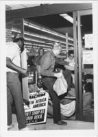 A Man Climbing Over Winn-Dixie Protesters, circa 1985
