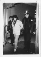 Woman Being Arrested at a Winn-Dixie Store Protest, circa 1985