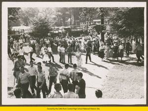 White students and soldiers in front of Central High School