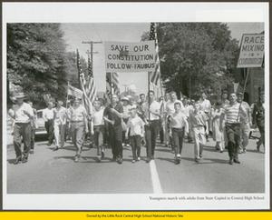 Children march with adults in segregationist parade