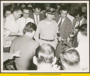 General speaking with reporters