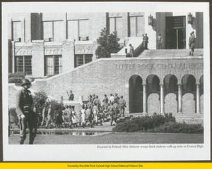 Black students walk to Central High School with 101st Airborne soldiers