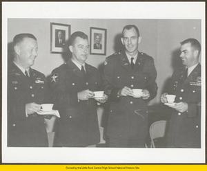 Captain Madden and three other military members at a faculty tea